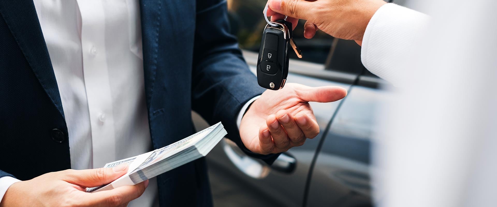 salesman handing over keys
